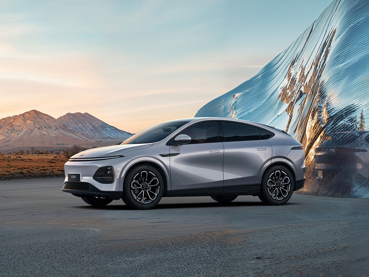 The 2026 XPENG G6 parked in front of a building